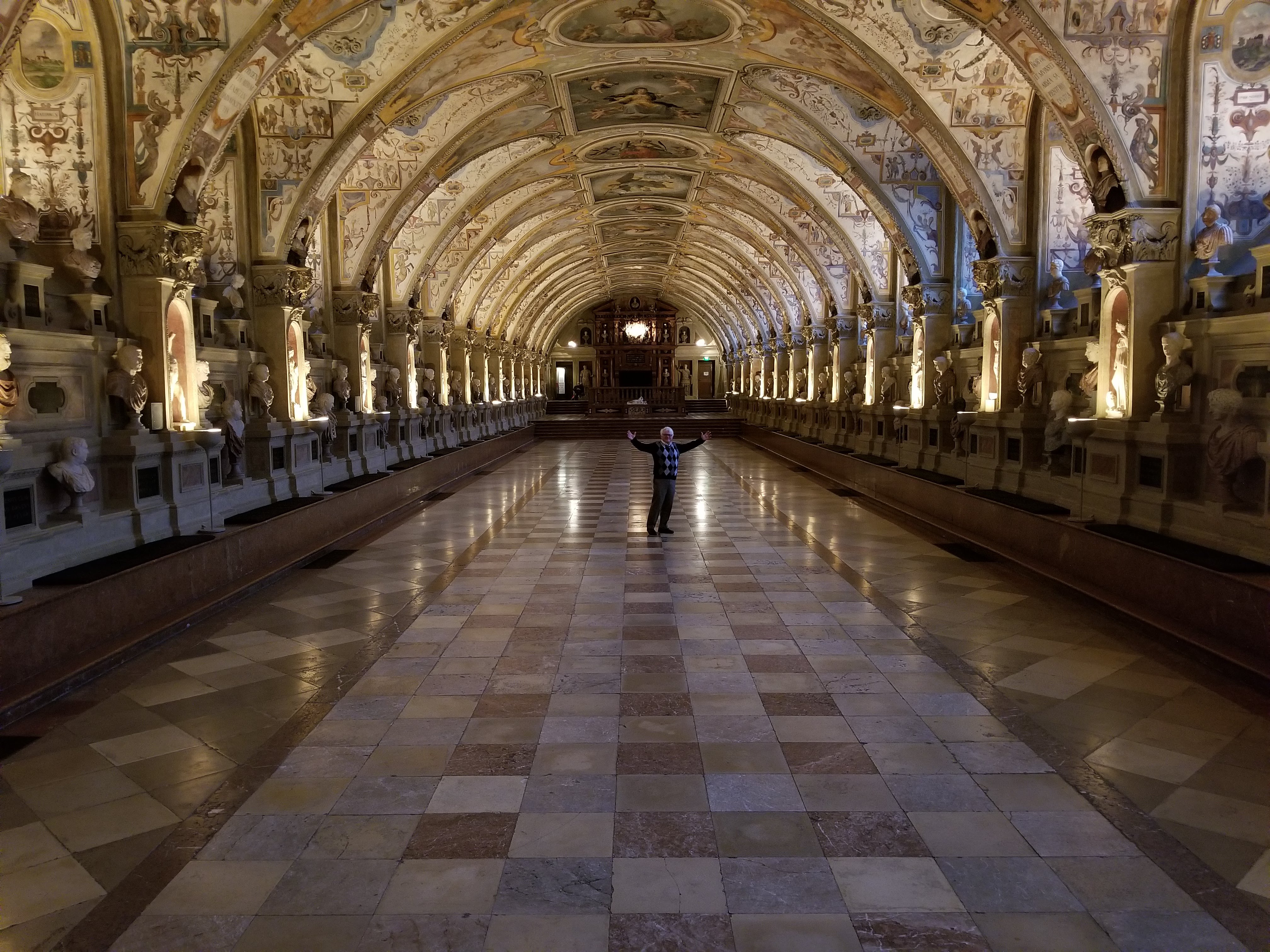 Arthur before a magnificent pipe organ